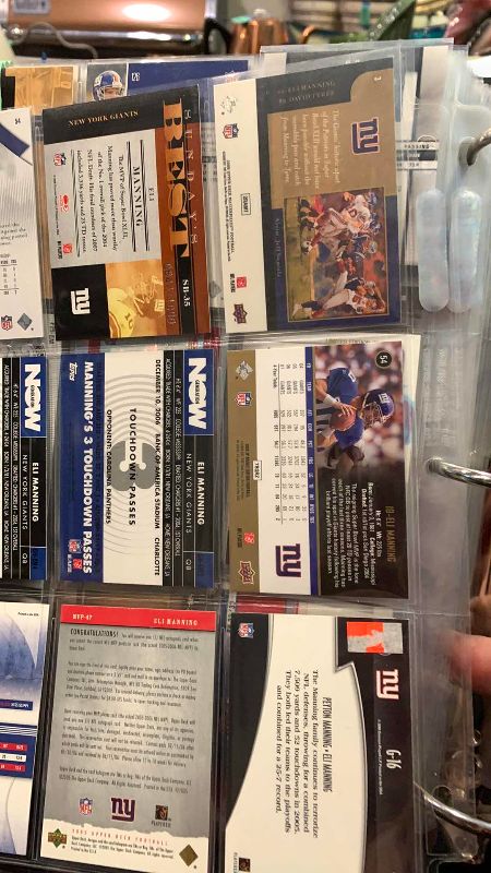 Photo 1 of 9-ELI MANNING FOOTBALL CARDS ONE NUMBERED