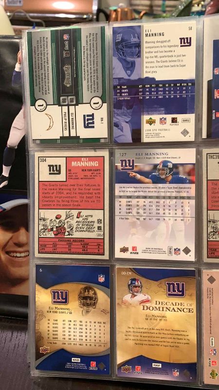 Photo 1 of 9-ELI MANNING FOOTBALL CARDS