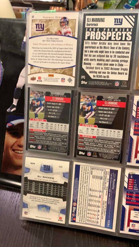 Photo 1 of 9-ELI MANNING FOOTBALL CARDS ONE NUMBERED