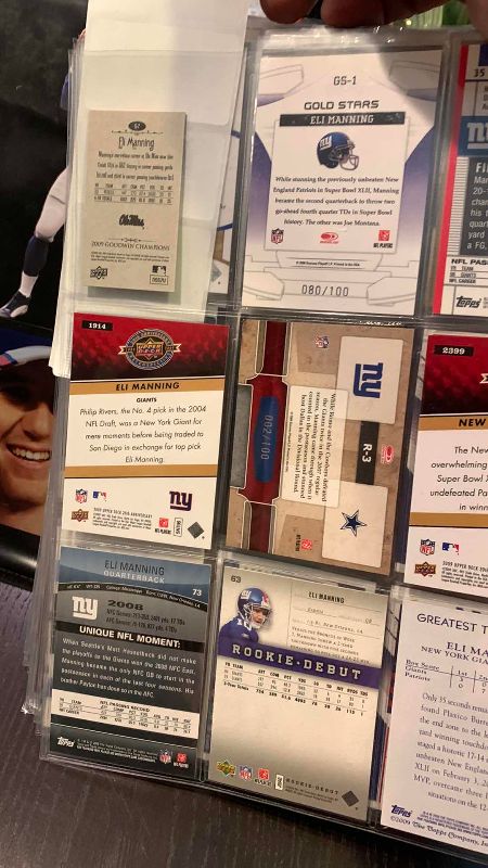 Photo 1 of 9-ELI MANNING FOOTBALL CARDS ONE NUMBERED