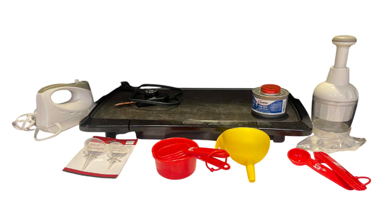 Photo 1 of KITCHEN ITEMS GRIDDLE, SLICER, AND MEASURING CUPS