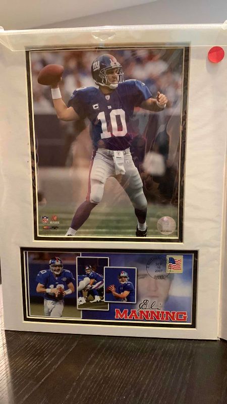Photo 1 of 2- 8 X 10 ELI MANNING NFL AUTHENTICATED PICTURES WITH FIRST DAY ISSUE STAMPS