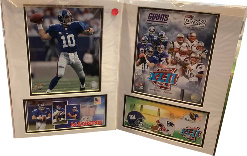 Photo 1 of 2- 8 X 10 ELI MANNING NFL AUTHENTICATED PICTURES WITH FIRST DAY ISSUE STAMPS