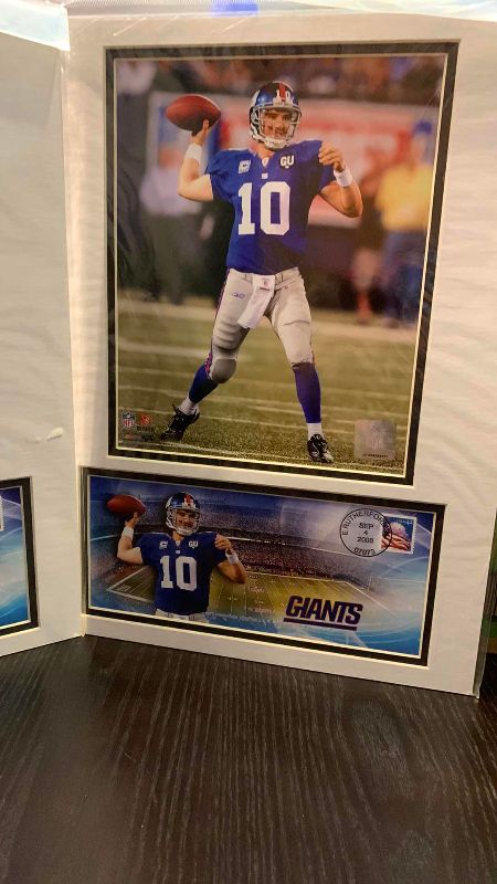 Photo 1 of 2- 8 X 10 ELI MANNING NFL AUTHENTICATED PICTURES AND FIRST DAY ISSUE STAMPS