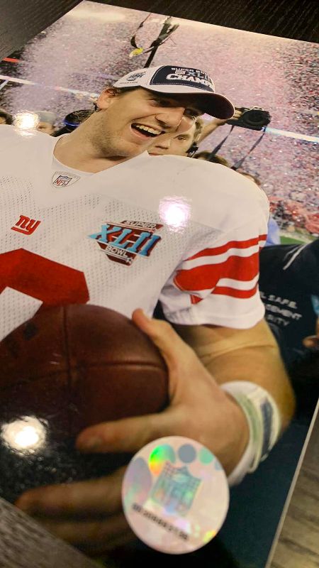 Photo 1 of 2- 8 X  10 ELI MANNING NFL SUPERBOWL MVP AUTHENTICATED PHOTOS