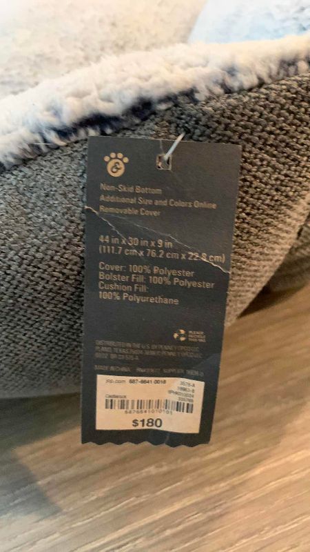 Photo 1 of PAW TAIL CUDDLER PET BED NON SKID BOTTOM 44" X 30" H 9"
