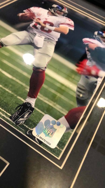 Photo 1 of ELI MANNING 8 x 10 PHOTOGRAPHS ONE NFL AUTHENTICATED