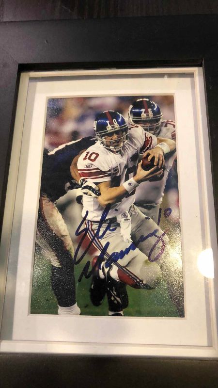 Photo 1 of ELI MANNING 4" X 6"  AUTHENTICATED AUTOGRAPHED PICTURE AND WATCH AD