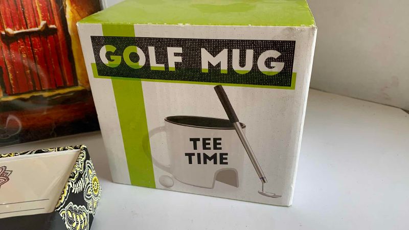 Photo 1 of MEMO PADS AND A PUTTING COFFEE MUG