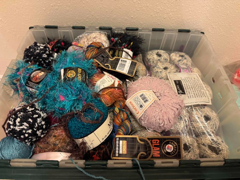 Photo 1 of LARGE TOTE OF SPECIALTY YARN/FIBER ART MATERIAL (TOTE NOT INCLUDED)