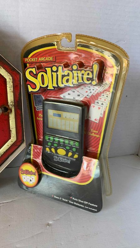 Photo 1 of SOLITAIRE GAME AND A NOVELTY SIGN