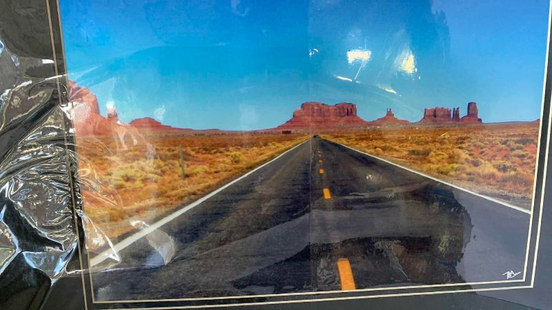Photo 1 of MATTED PRINT OF "MONUMENT VALLEY" FROM FORREST GUMP POINT ON U.S. ROUTE 163- SIGNED BY PHOTOGRAPHER 16” X 19”