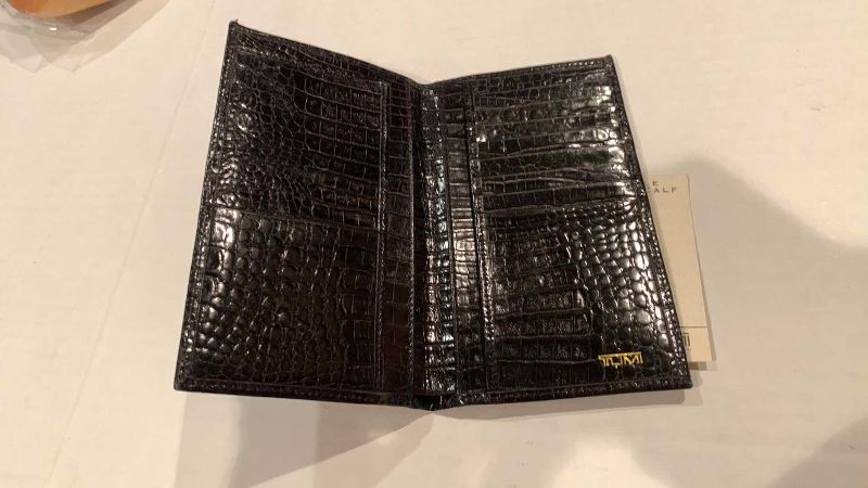 Photo 1 of TUMI CROCODILE EMBOSSED CALF WALLET