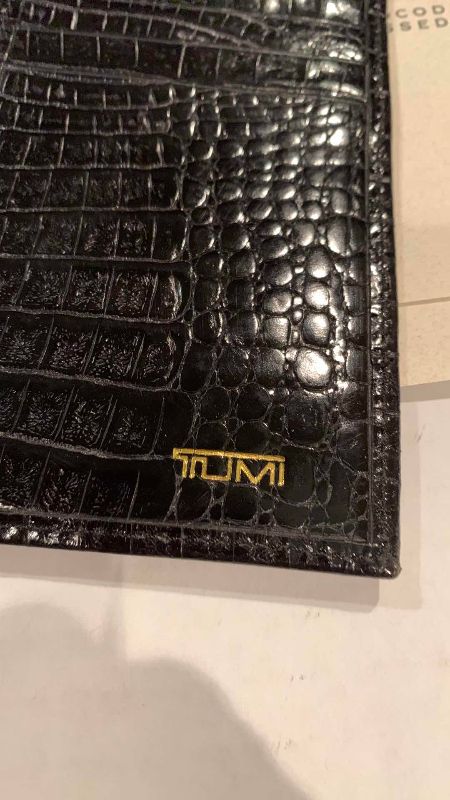 Photo 1 of TUMI CROCODILE EMBOSSED CALF WALLET