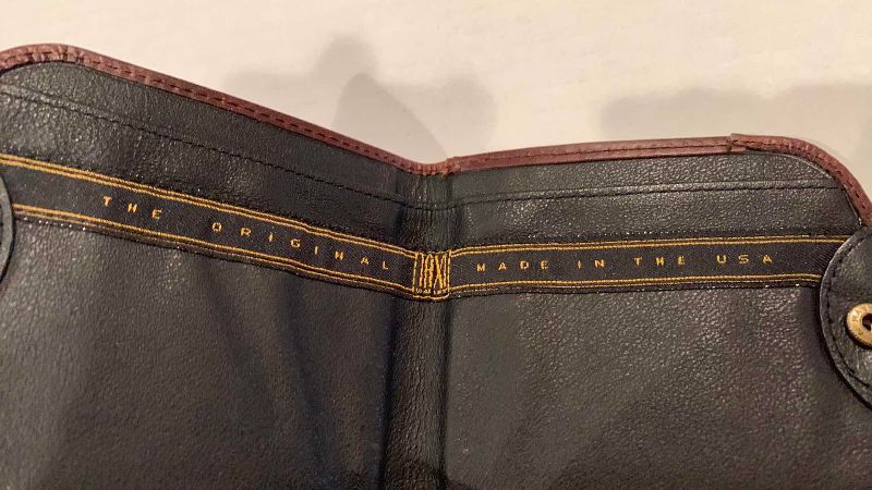 Photo 1 of A COIN PURSE, ID HOLDER, AND LENS CASE