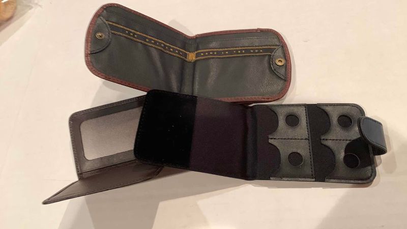 Photo 1 of A COIN PURSE, ID HOLDER, AND LENS CASE