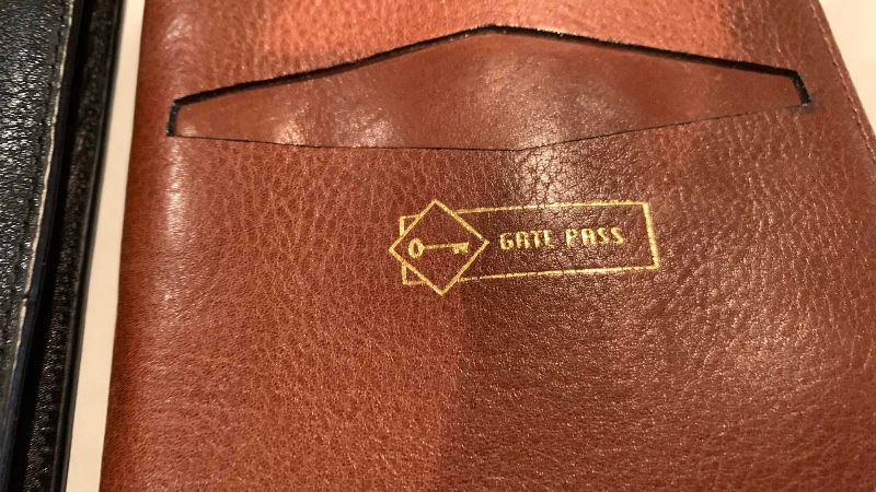 Photo 1 of COACH DOCUMENTS HOLDER AND A GATE PASS HOLDER