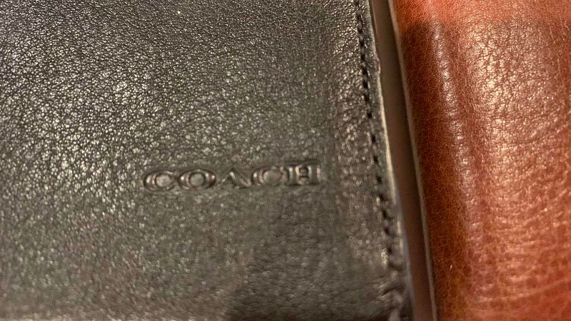 Photo 1 of COACH DOCUMENTS HOLDER AND A GATE PASS HOLDER