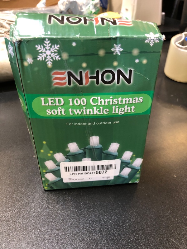 Photo 2 of Enhon Slow Twinkling Christmas Lights, 100 Lights 35 Ft Twinkle Lights Pulsing Christmas Lights, 5mm LED Wide Angle Soft Random Shimmering Light Set with Green Wire(Warm White)