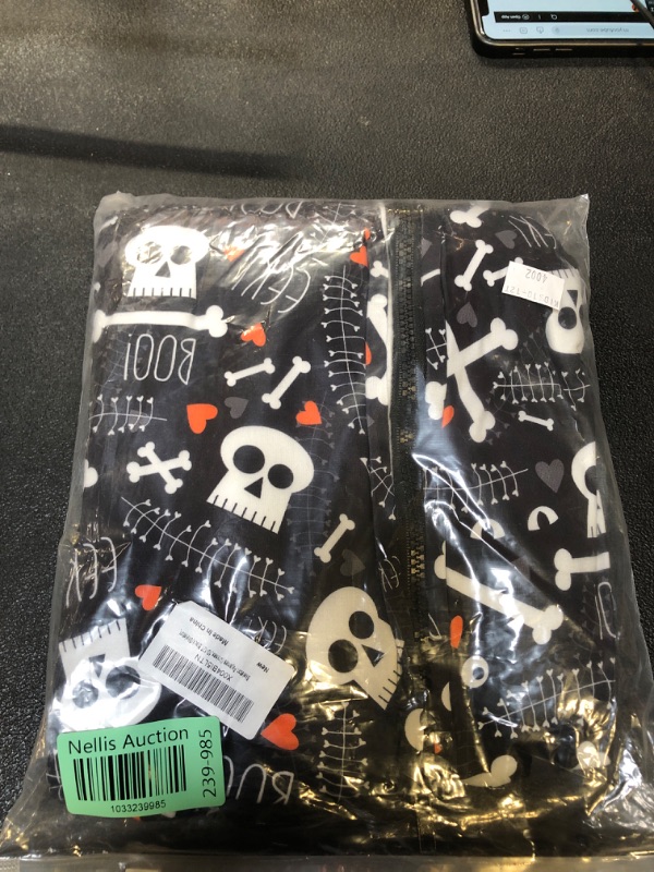 Photo 2 of VNVNE Matching Halloween Pajamas for Family?Pumpkin Skeleton Onesie Pjs for Adult/Couples/Women/Men?One Piece Holiday Loungewear Sleepwear(Youth,10-12T,Black/Skeleton)