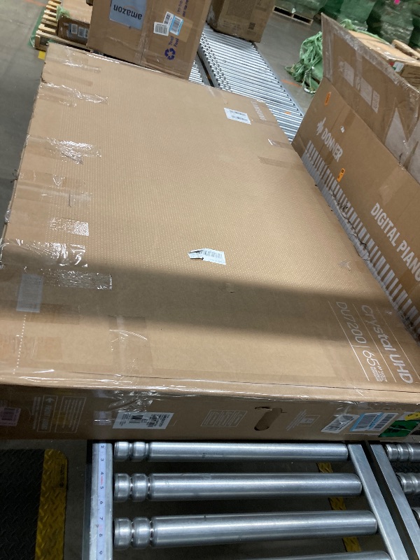 Photo 1 of 65” Class DU7200 Crystal UHD 4K Smart Tizen TV.