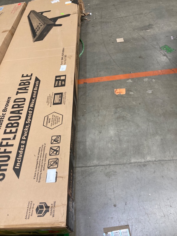 Photo 1 of GoSports Premium 9 ft Shuffleboard Table with 8 Pucks, Shuffleboard Wax, and Brush