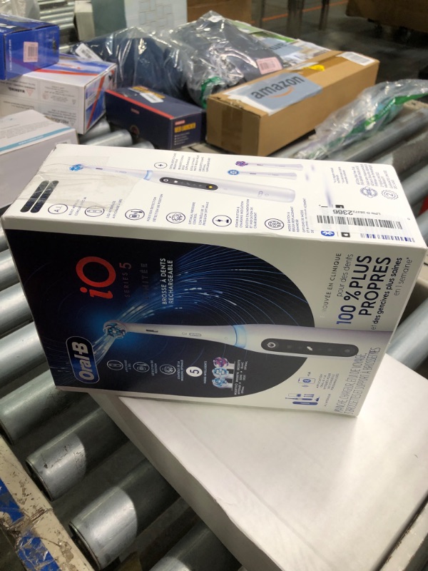 Photo 1 of Oral-B iO Deep Clean + Whiten Rechargeable Electric Toothbrush with Visible Pressure Sensor, 2 Minute Timer, 5 Cleaning Settings, 1 iO5 Limited, 3 Toothbrush Heads, Travel Case & Refill Holder, White