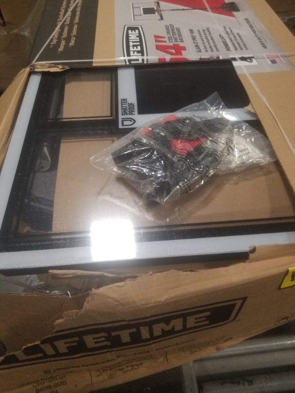 Photo 1 of Lifetime Adjustable Portable Basketball Hoop, 54-Inch Steel-Framed Polycarbonate Backboard