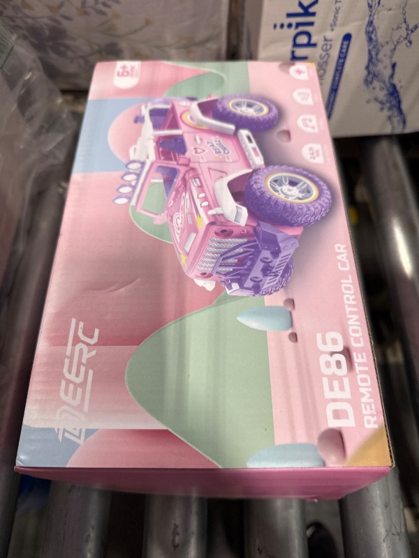 Photo 2 of ***NO REMOTE*** DEERC Pink Remote Control Car for Girls with Fog Mist & Music, 1:16 RC Car with LED Lights for Kids, 2.4Ghz All Terrain SUV Truck Gifts, Off-Road Racing Vehicle Toy Car, Girls Toys