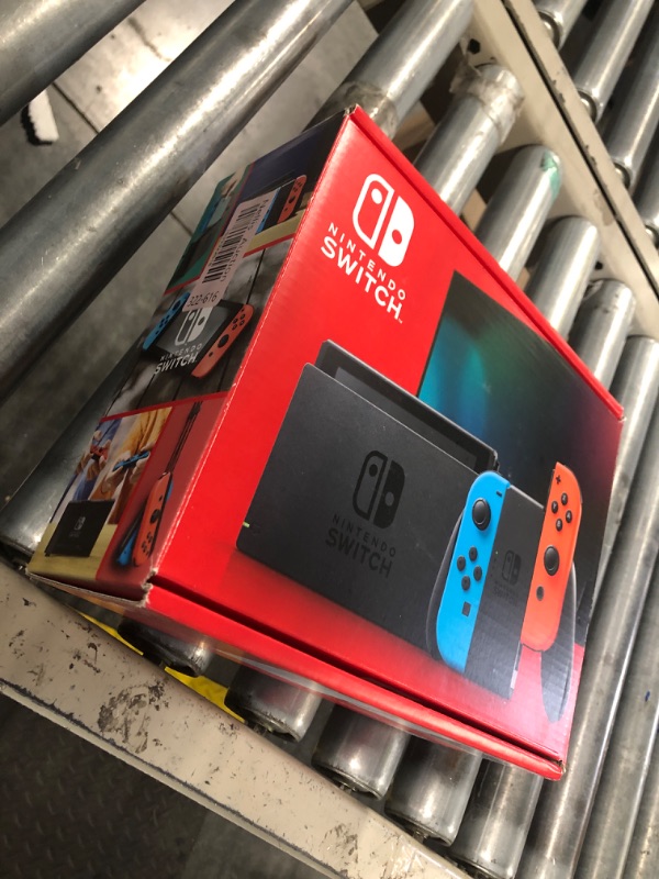 Photo 2 of ****LIKE NEW, HAS BEEN OPENED**** Nintendo Switch™ with Neon Blue and Neon Red Joy?Con™