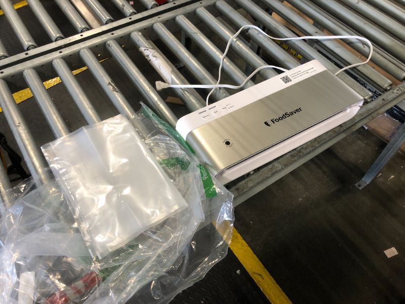 Photo 1 of ***close sensor has a little problem, when use item, have to use hand from left side push the lid down a little bit then power can be turned on*** FoodSaver Compact Vacuum Sealer Machine with Airtight Bags and Roll - Ideal for Sous Vide and Airtight Food 