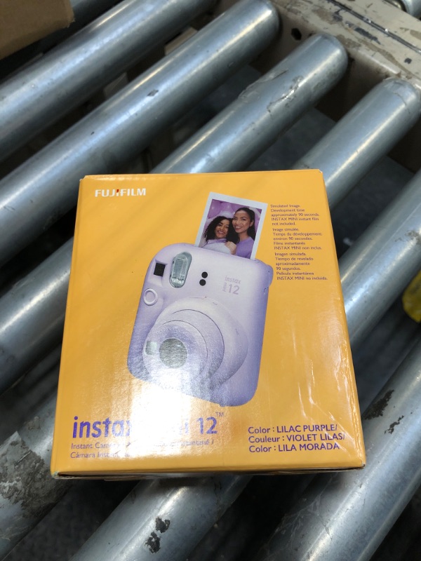 Photo 2 of **USED***CAMERA ONLY****Fujifilm Instax Mini 12 Instant Camera Pastel Blue with Film Value Pack (40 Sheets) + Accessories Including Galaxy Carrying Case Strap, Photo Album, Stickers (Purple)