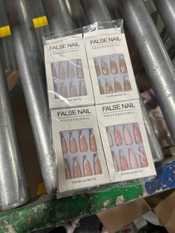 Photo 1 of ***USED***Press on nail set including wear tool and 96 Pas stiletto false nail in various sizes for a good fit. Easy to apply and durable for salon-quality results at home.