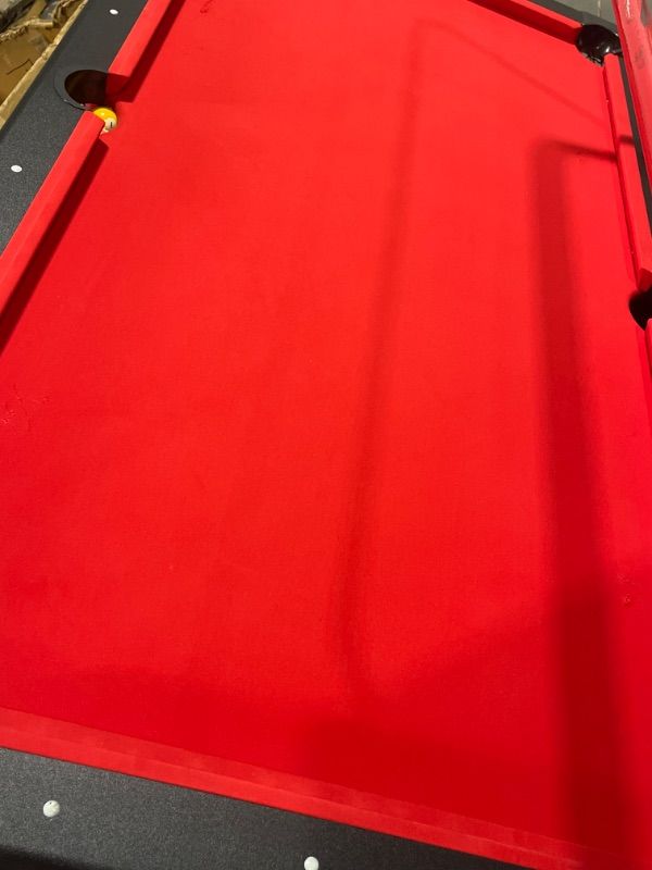 Photo 4 of ***NO POOL STICKS INCLUDED-MISSING BALLS-TORN SURFACE***
GoSports 7ft Billiards Table - Portable Pool Table - Includes Full Set of Balls, 2 Cue Sticks, Chalk and Felt Brush; Choose Size and Color 