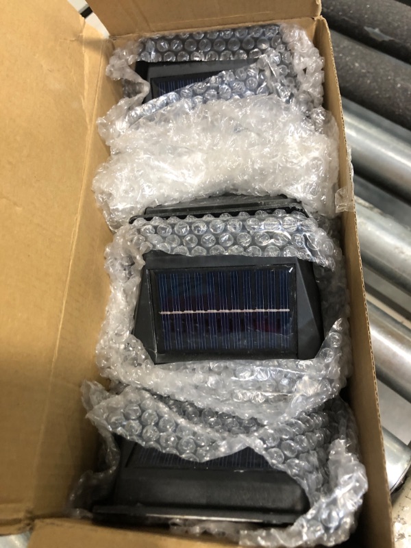 Photo 1 of ****USED****GIGALUMI Solar Wall Lights Outdoor, Dusk to Dawn Motion Sensor Lights Waterproof, 4 Pack Motion Sensor Solar Porch Lights with 3 Modes, for Patio, Garage, Shed