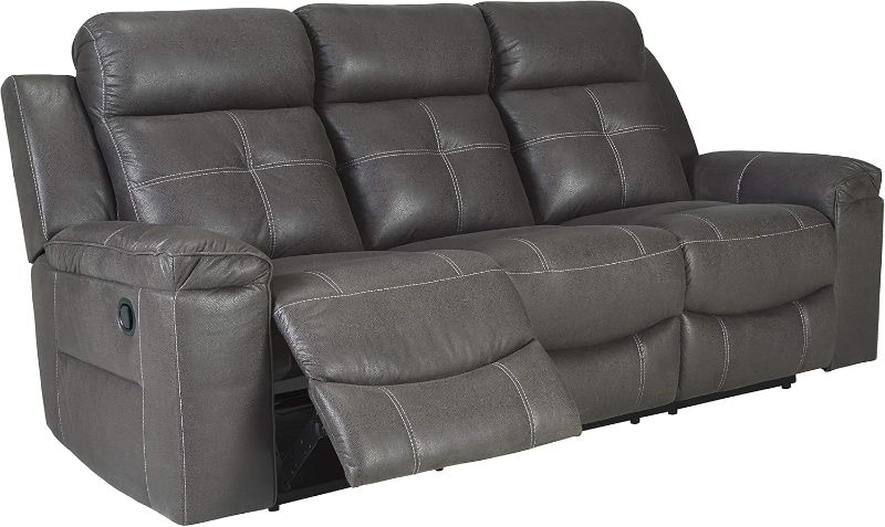 Photo 1 of *similar item* Signature Design by Ashley Modern Faux Leather Manual Pull Tab Double Reclining Sofa, Dark Gray
