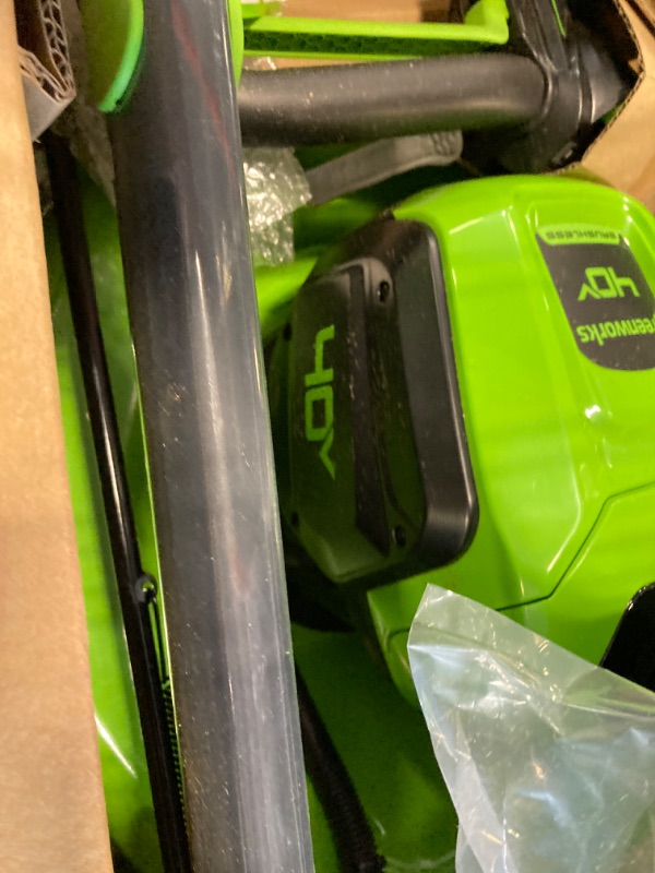 Photo 4 of ***MISSING PARTS*** *** NOT FUNCTIONAL**** ***SELLING AS PARTS *** Greenworks 40V 21" Brushless Cordless (Self-Propelled) Lawn Mower (LED Headlight + Aluminum Handles), 5.0Ah Battery and Charger Included (75+ Compatible Tools)