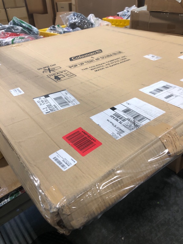 Photo 1 of Coleman Pop-Up Camping Tent with Instant Setup, 2/4 Person Tent Sets Up in 10 Seconds with Pre-Assembled Poles, Adjustable Rainfly, & Taped Floor Seams