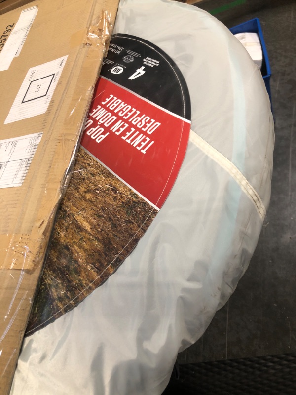 Photo 1 of Coleman Pop-Up Camping Tent with Instant Setup, 2/4 Person Tent Sets Up in 10 Seconds with Pre-Assembled Poles, Adjustable Rainfly, & Taped Floor Seams