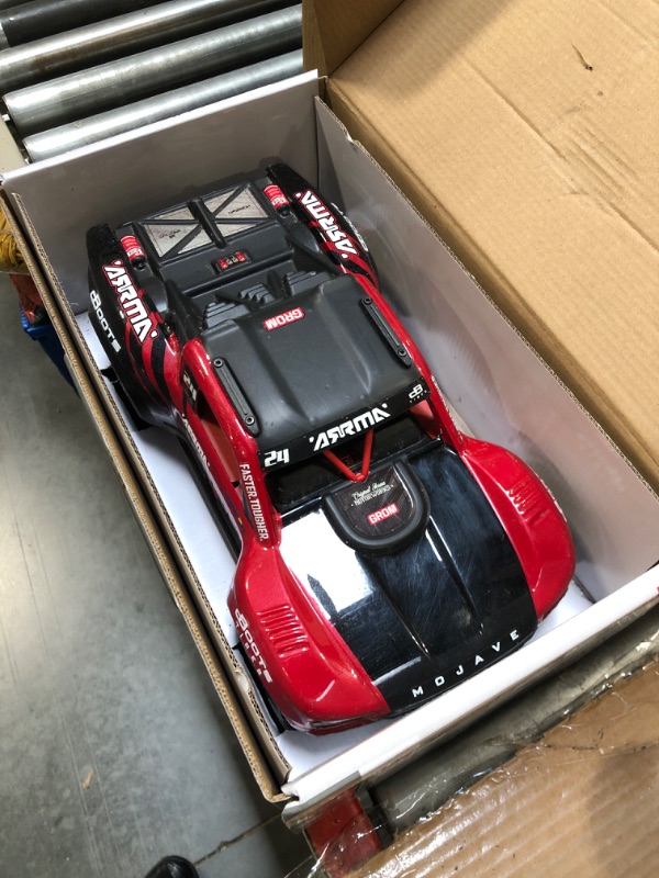 Photo 2 of ***Final Sale, NO RETURNS*** ARRMA RC Truck Mojave GROM 4x4 Smart Small Scale Desert Truck, RTR (with Battery and Charger Included) Red/Black ARA2104T1