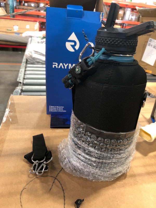 Photo 2 of ***MISSING PIECES***RAYMYLO Insulated Water Bottle 64 oz, Triple Wall Vacuum Stainless Steel (Cold for 48 Hrs), Leak Proof & Non-BPA, Half Gallon Water Flask Jug with Paracord Handle & Straw Spout Lids