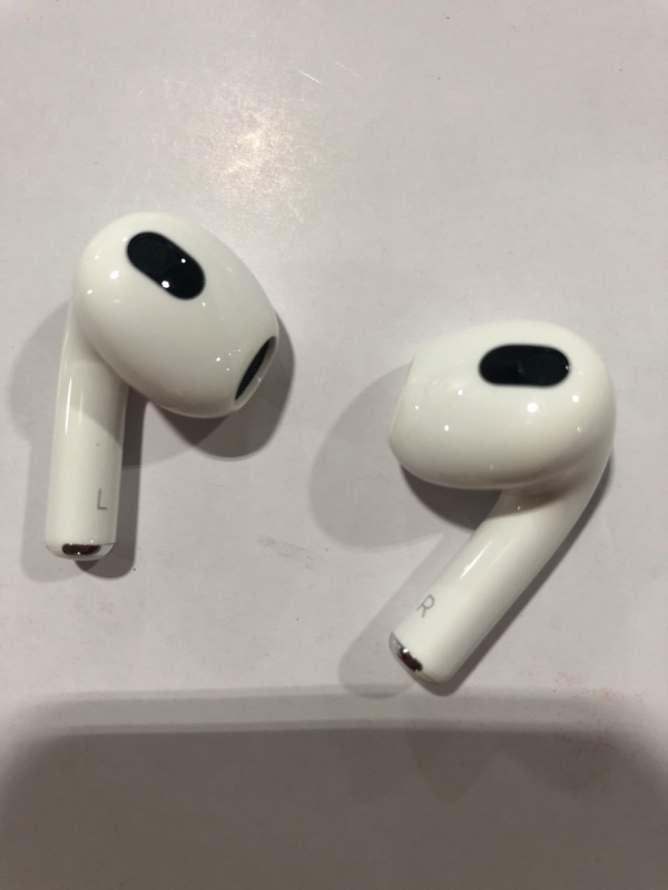 Photo 5 of Apple AirPods (3rd Generation) Wireless Ear Buds, Bluetooth Headphones, Personalized Spatial Audio, Sweat and Water Resistant, Lightning Charging Case Included, Up to 30 Hours of Battery Life
