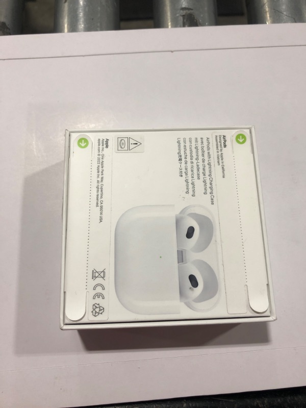 Photo 2 of Apple AirPods (3rd Generation) Wireless Ear Buds, Bluetooth Headphones, Personalized Spatial Audio, Sweat and Water Resistant, Lightning Charging Case Included, Up to 30 Hours of Battery Life
