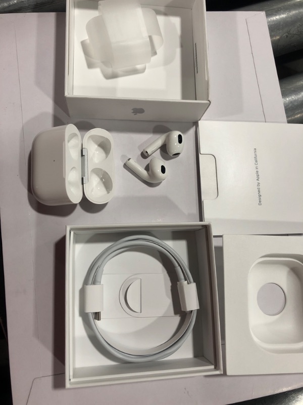 Photo 3 of Apple AirPods (3rd Generation) Wireless Ear Buds, Bluetooth Headphones, Personalized Spatial Audio, Sweat and Water Resistant, Lightning Charging Case Included, Up to 30 Hours of Battery Life
