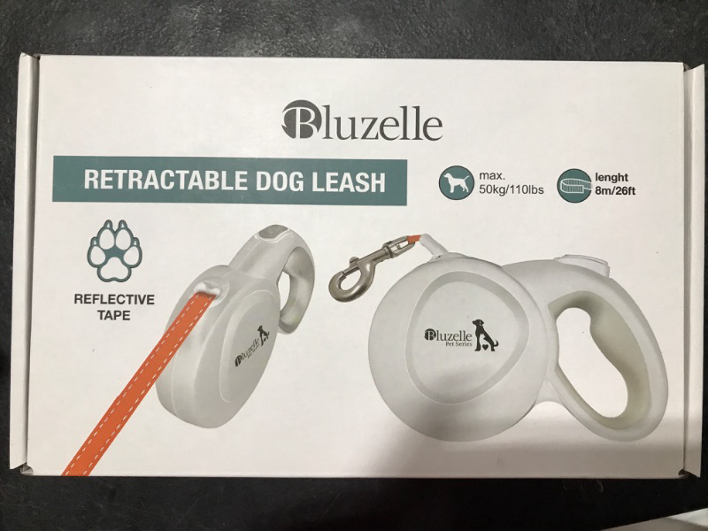 Photo 2 of 26ft Retractable Leash for Dogs up to 110lbs, Bright Neon Orange Reflector Nylon Belt with 360° Snap Hook Metal, Reliable Braking System One-Hand Operation Ergonomic Rubber Handle, White