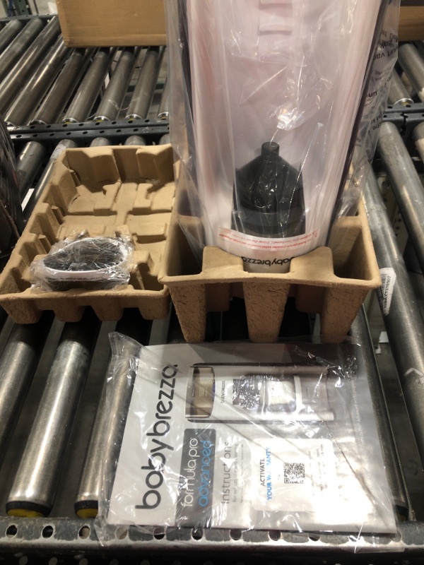 Photo 1 of Baby Brezza New and Improved Formula Pro Advanced Formula Dispenser Machine - Automatically Mix a Warm Formula Bottle Instantly - Easily Make Bottle with Automatic Powder Blending, White Base White