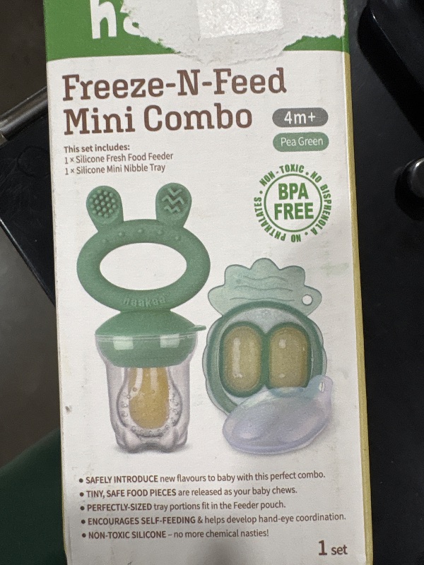 Photo 2 of Haakaa Baby Fruit Food Feeder Pacifier | Breastmilk Popsicle Molds for Teething | Silicone Feeder and Teether for Baby Teething Relief & Infant Safely Self Feeding, BPA Free (Pea Green)