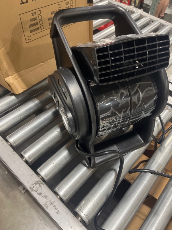 Photo 2 of Lasko 12” Utility Fan for Job Site or Home Use, 289 CFM, Pivoting High Velocity Blower Fans, 3 Speeds, 2 Accessory Outlets 120V, Black, U12104
