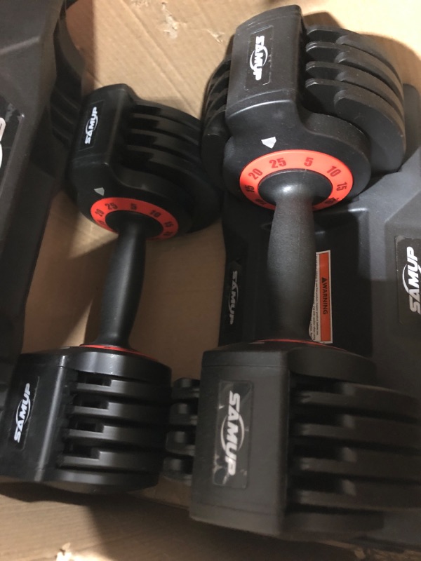 Photo 1 of 2 pack of 25 lb dumbell weights 