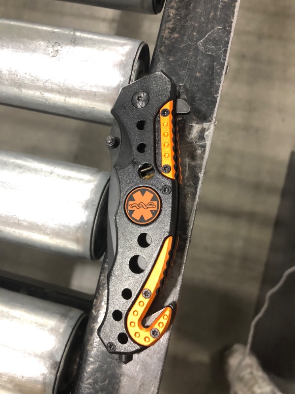 Photo 1 of BLACK AND ORANGE POCKET KNIFE